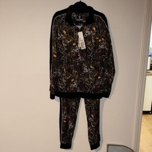 Rebel Minds Black Jacket with Gold Patterns